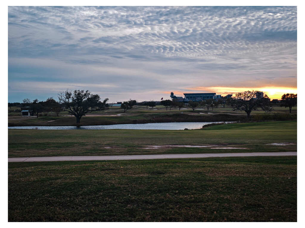 Landscape - Golf Green with Trees and Cloudy Sky at Dusk