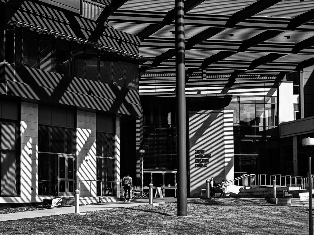 University Campus - People walking Near Modern Engineering Building
