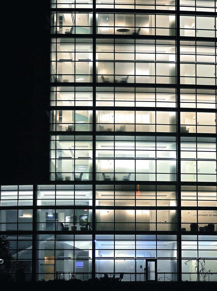 Office Building - Glass Windows Lit Across Multiple Floors